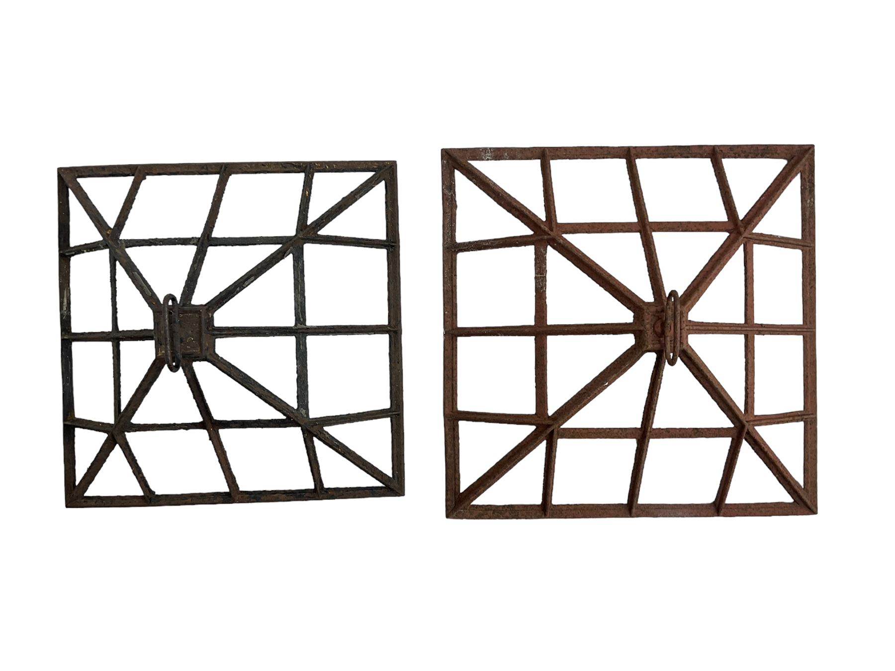 Two 19th century cast iron cloche lid frames, pyramid form with astragal frame, with carrying handle