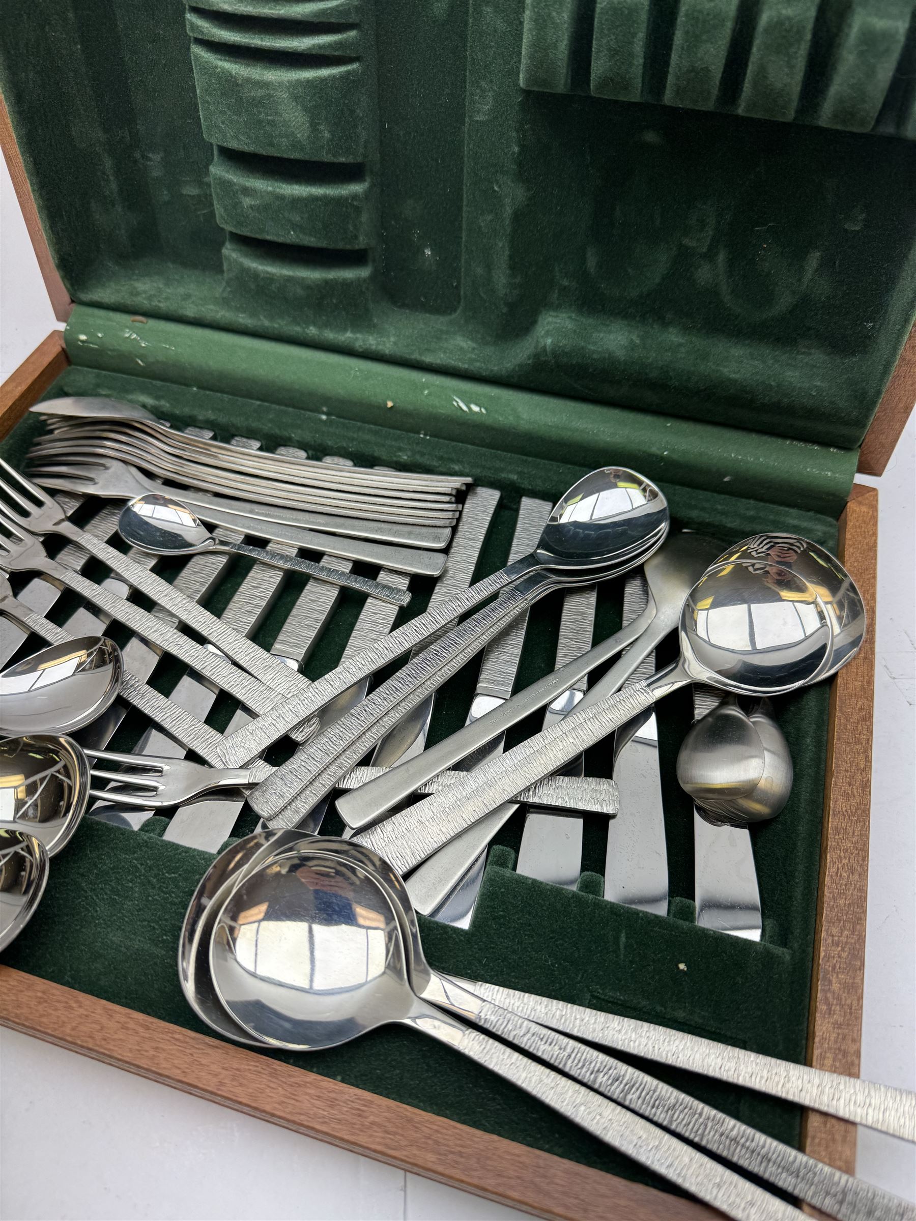 Viners Studio canteen of cutlery for six place settings, with textured bark pattern handles designed by Gerard Beeney, contained within fitted wooden case 