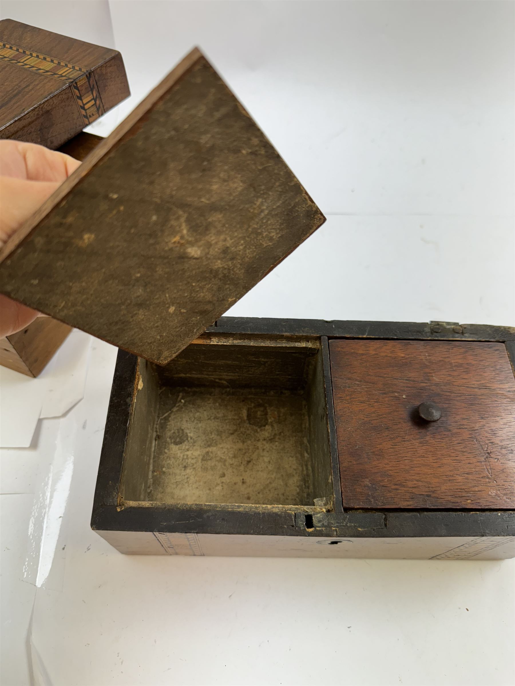 Group of wooden boxes and tins, including oak two compartment cigarette box, money tins, inlaid tea caddy, etc