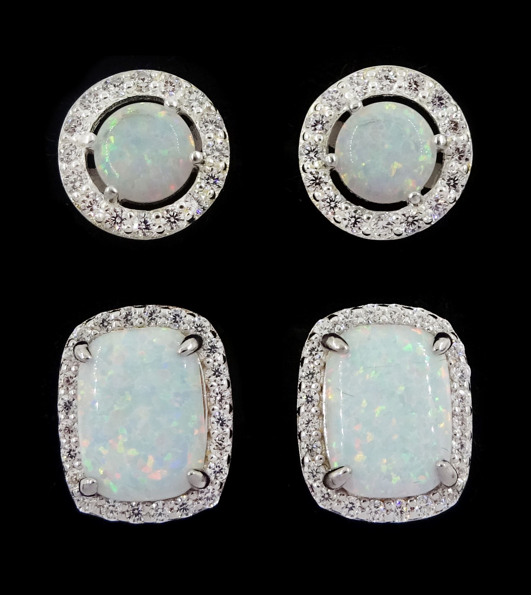 Two pairs of silver opal and cubic zirconia stud earrings, stamped 925