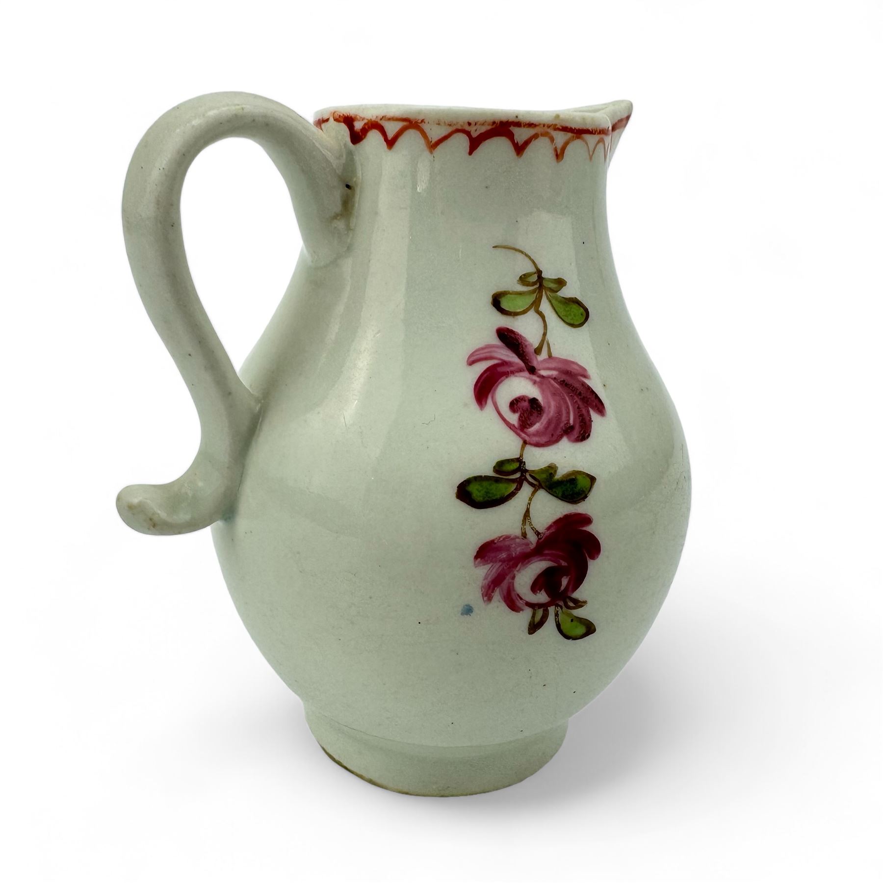 18th century Lowestoft porcelain sparrow beak jug, hand painted in polychrome enamels with a starflower and floral sprays, within line and loop brick-red border, H8cm