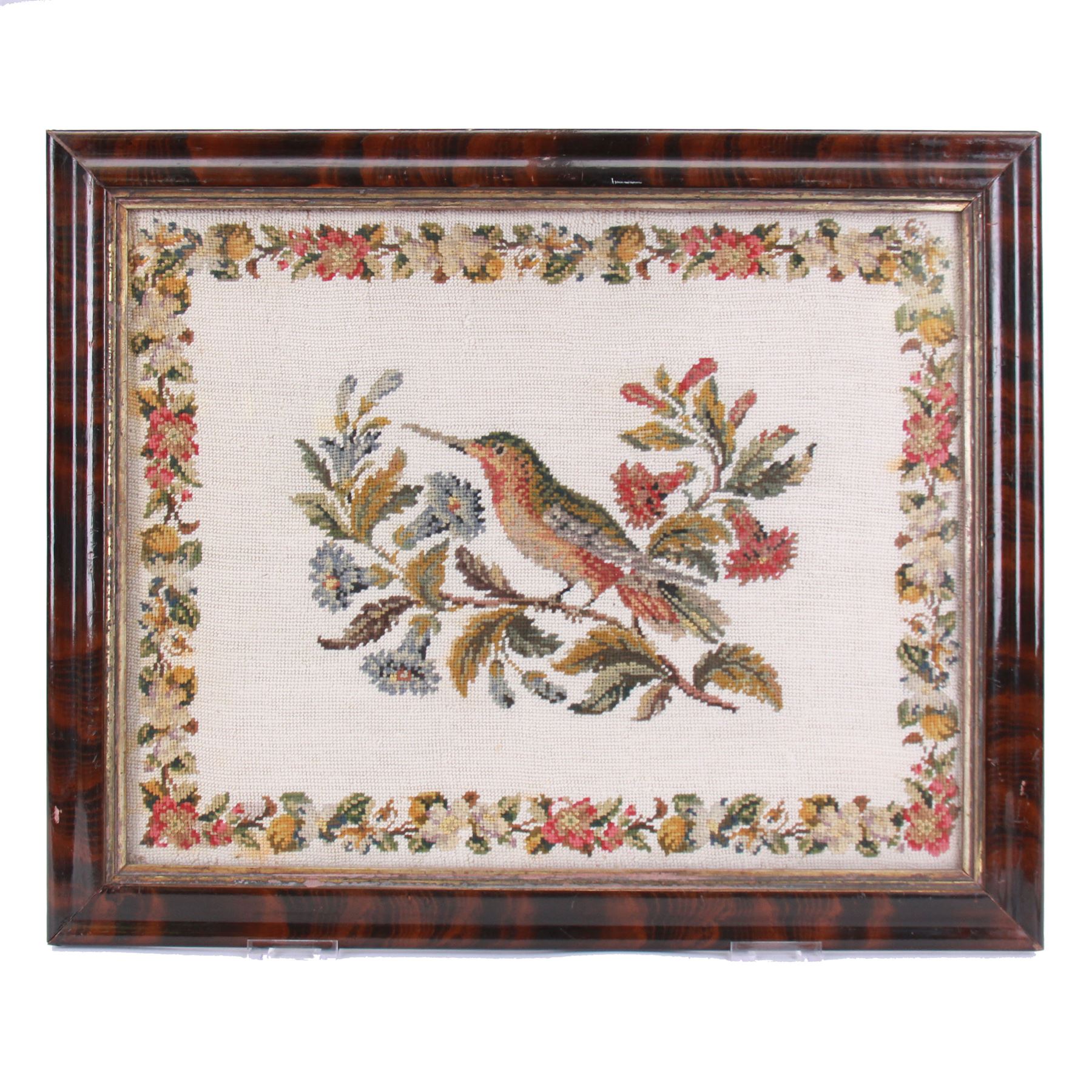 Victorian woolwork, depicting a kingfisher perched upon a flowering branch, with conforming flowering vine border, in painted rosewood effect frame, woolwork 40cm x 51cm