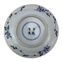 19th century Chinese blue and white saucer dish decorated in the Long Eliza pattern, four character mark within double circle beneath, D13.5cm, and a Chinese shaped dish painted with lotus flowers, provincial shop mark within square border beneath (2)