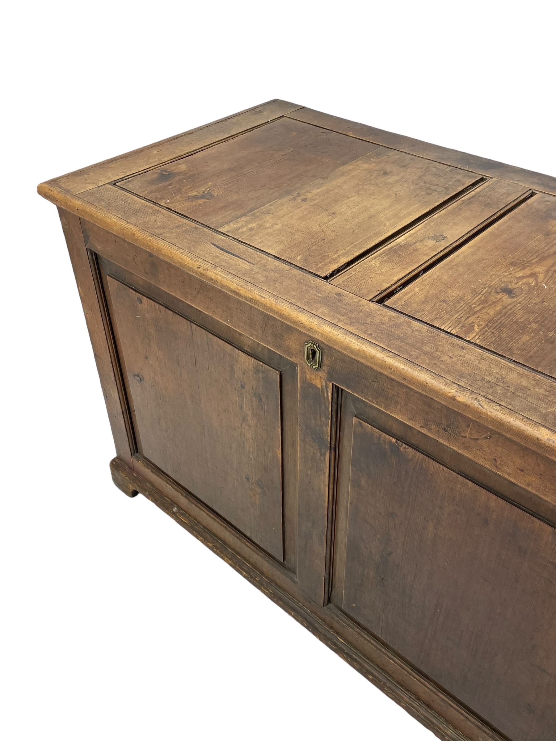 19th century pine blanket chest, double panelled hinged lid over panelled front and sides, on bracket feet