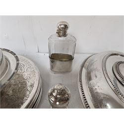 Glass hip flask, with silver cap/collar and plated cup and a silver topped pepper shaker, together with silver plated items including place mats, coasters, serving dishes, etc