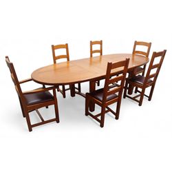 French solid oak oval extending dining table with two leaves, square supports joined by curved 'H' stretcher; set of six (4+2) ladder back chairs with upholstered seats (W59cm)