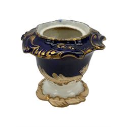 19th century porcelain inkstand, the oblong twin handled base centrally painted with a floral bouquet, flanked by two footed inkwells and covers, with rococo-inspired acanthus moulded borders and handles, pattern no. 2/3339, L26.5cm 