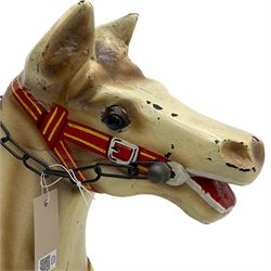 20th century rocking horse, painted body, glass eyes, metal stirrups and chain, wooden bow rocker
