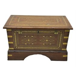 20th century mahogany chest, rectangular hinged top enclosing removable compartments with carved starburst motifs with linear and geometric patterns, brass inlay to the top and front, mounted corners and edges, on bracket base