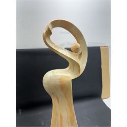 Abstract marble sculpture modelled as a dancer, upon a rectangular base, H58cm