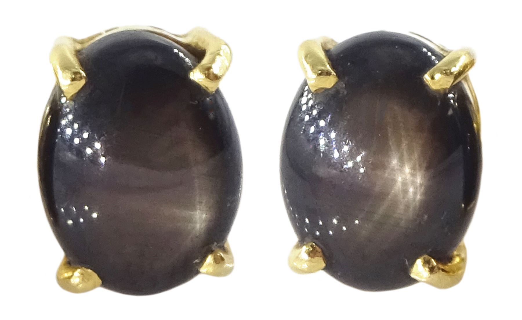 Pair of gold black / brown star sapphire stud earrings