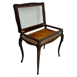 Victorian inlaid rosewood bijouterie table cabinet, shaped form, enclosed by hinged bevel glazed lid with shell and floral inlays, fabric lined interior, glazed sides within foliate cast gilt metal edging, on cabriole supports with floral cast gilt metal mounts and terminal caps 