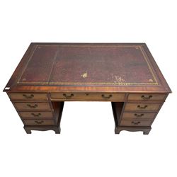 Georgian design mahogany twin pedestal desk, the moulded rectangular top inset with leather writing surface, fitted with eight drawers (W152cm, D91cm, H76cm); and a matching two-drawer filing cabinet (W54cm, H76cm, D71cm)
