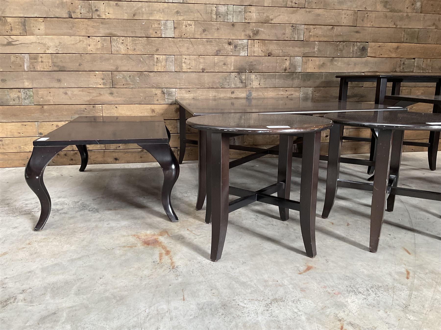 Large square rosewood coffee table, two matching circular tables and lamp table; and a rectangular coffee table and matching lamp table