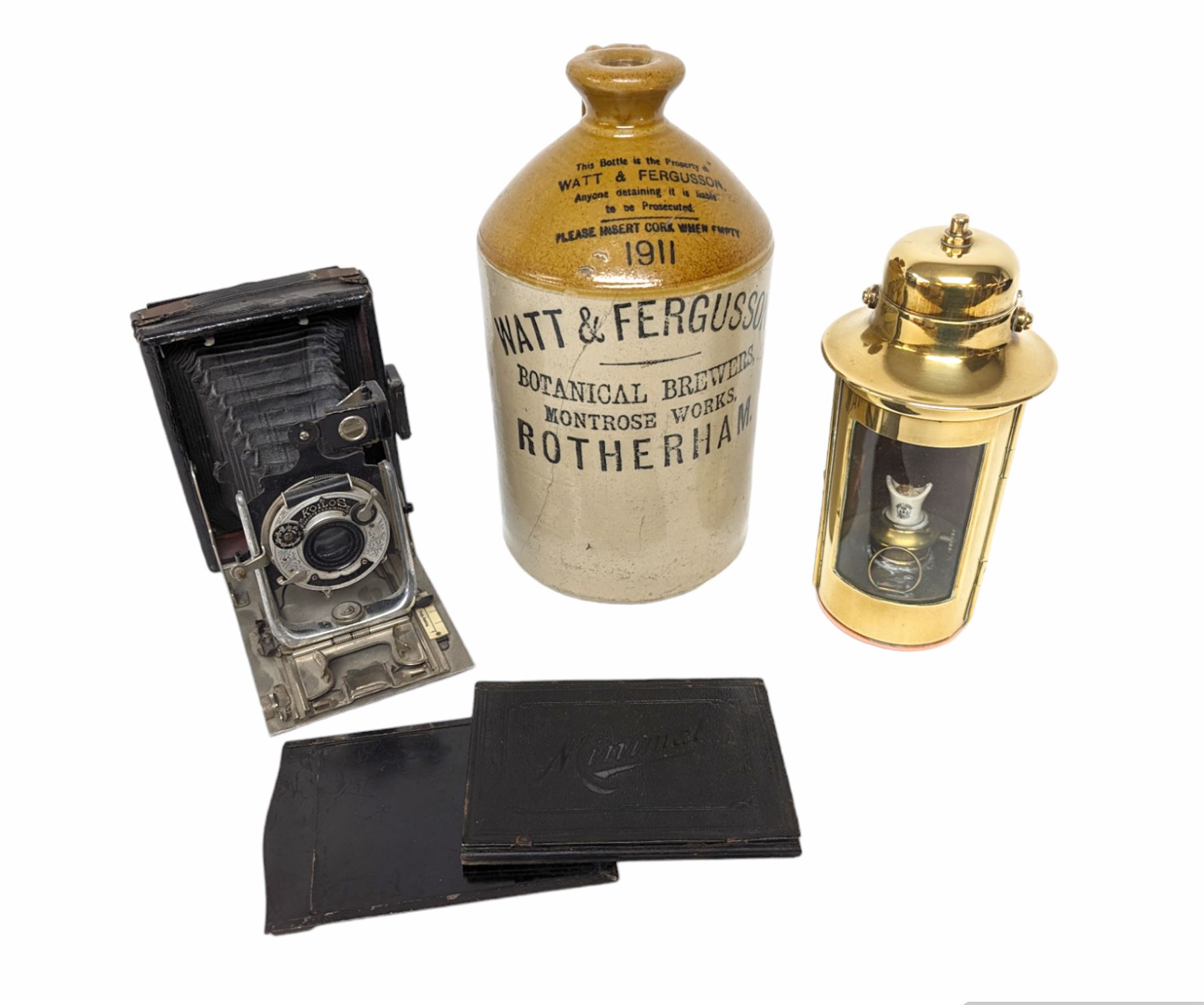 Watt & Ferguson Botanical Brewers stoneware flagon, together with a Sherwoods copper and brass lamp and a Koilos Minimal plate camera, flagon H26.5cm