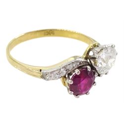 Early 20th century gold old cut diamond and ruby crossover ring, with diamond set shoulders, stamped 18ct, diamond approx 0.70 carat, ruby approx 0.75 carat