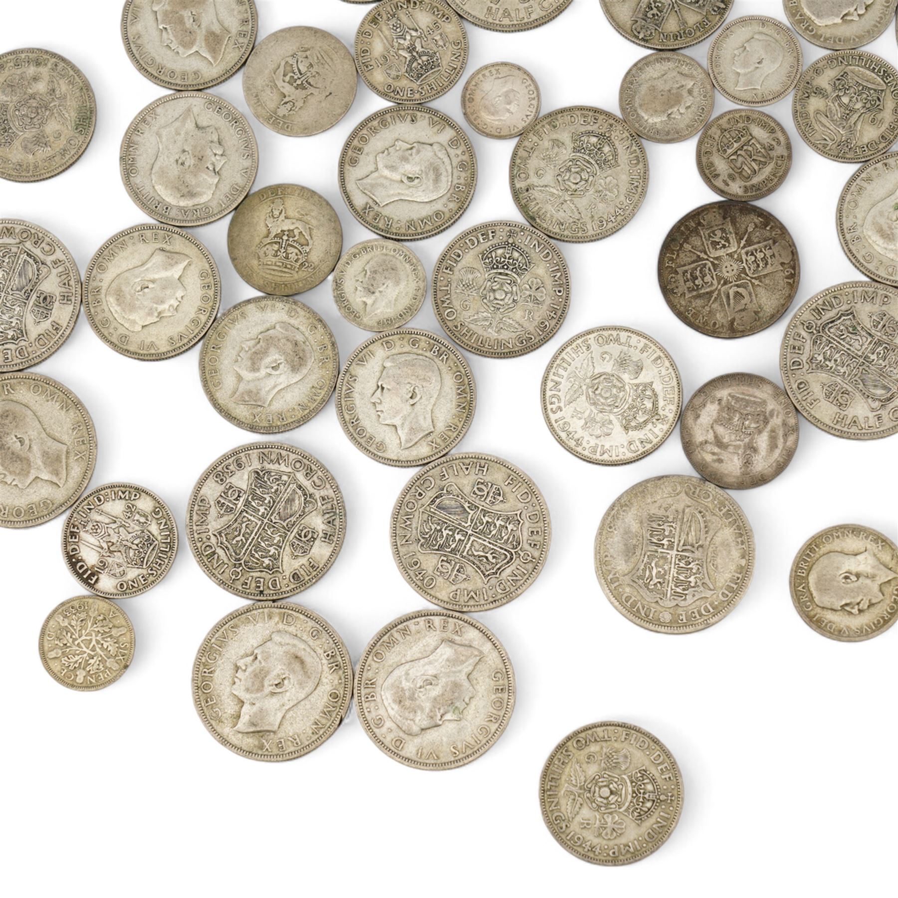 Approximately 610 grams of Great British pre 1947 silver coins, including sixpences, shillings, halfcrowns etc