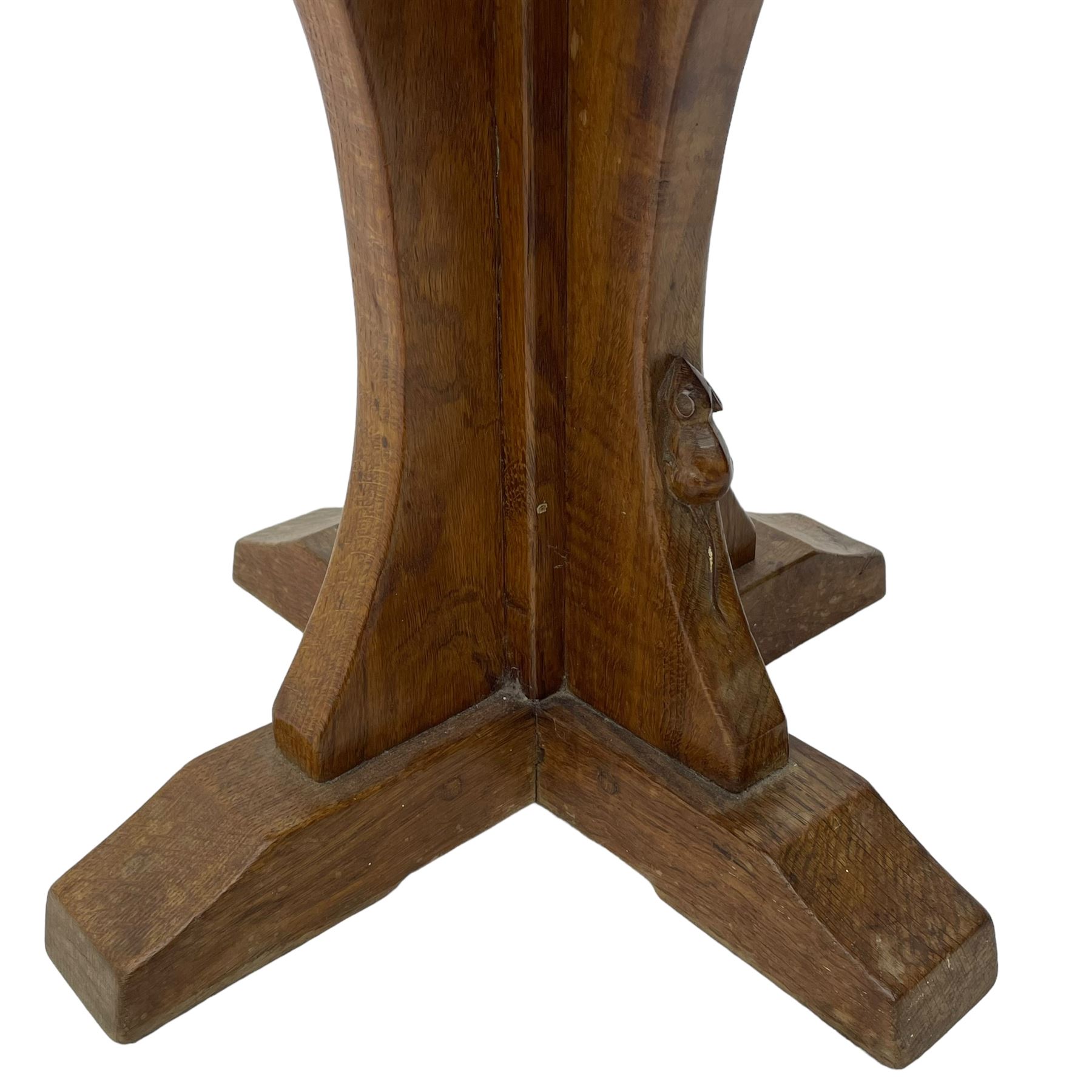 Mouseman - oak occasional table, octagonal adzed top, cruciform pedestal on sledge feet, carved with mouse signature, by the workshop of Robert Thompson, Kilburn 