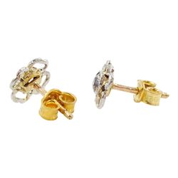 Pair of gold and platinum old cut diamond flower head stud earrings