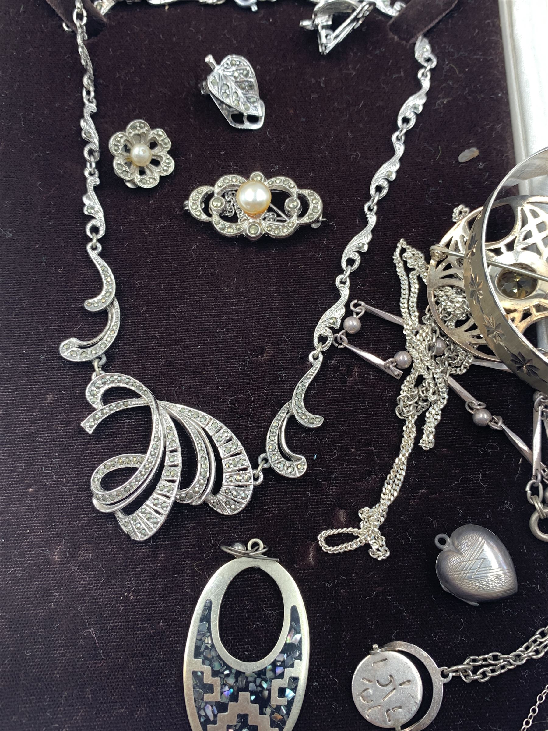 Silver jewellery, including an amber set necklace, pair of earrings and pin, silver charm bracelet, silver ingot pendant, filigree jewellery and other silver jewellery