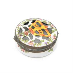 18th century Bilston enamel patch box, of circular form with pierced hinged cover decorated in polychrome enamel with a crown amongst floral sprigs, possibly made for the 1760 Coronation, D4.3cm