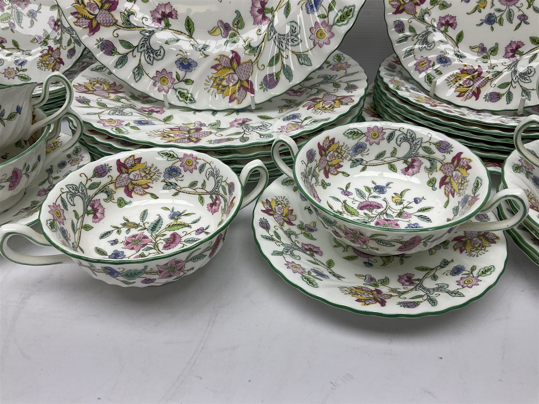 Minton Haddon Hall part tea and dinner service, including six cups and saucers, six dinner plates, six side plates, six twin handled bowls and saucers etc (44) 