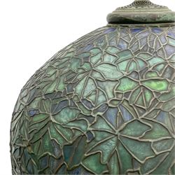 In the manner of Tiffany & Co. - bronze 'Chased Pod' design floor lamp, 'Maple Leaf' dome leaded glass shade decorated with flowers in blue and green shades, six branches on column decorated with stylised trailing stems terminating to circular base with stylised plant decoration, on scrolled feet, the base stamped 'Tiffany Studios New York 379' the inner shade stamped 'Tiffany Studios New York [...]'