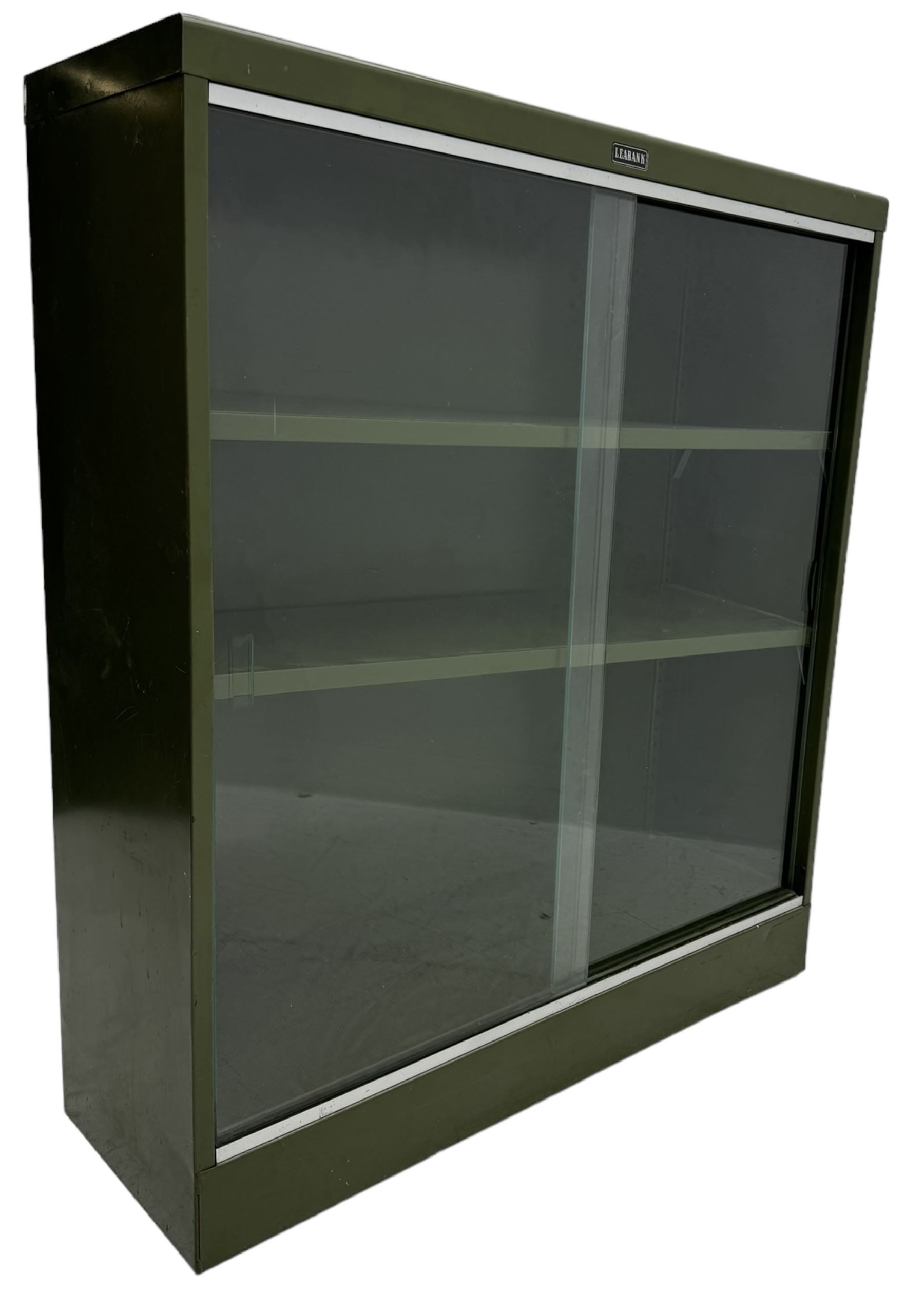 Mid-20th century 'Leabank' metal display cabinet, two sliding glass doors enclosing two adjustable metal shelves, olive green finish with chrome trim