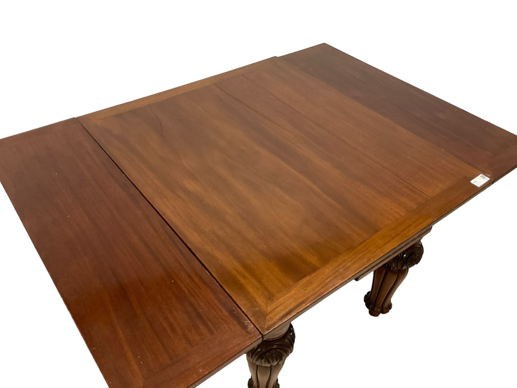 Victorian mahogany draw-leaf extending dining table, rectangular top with two additional leaves, on turned foliage carved and lobe moulded supports