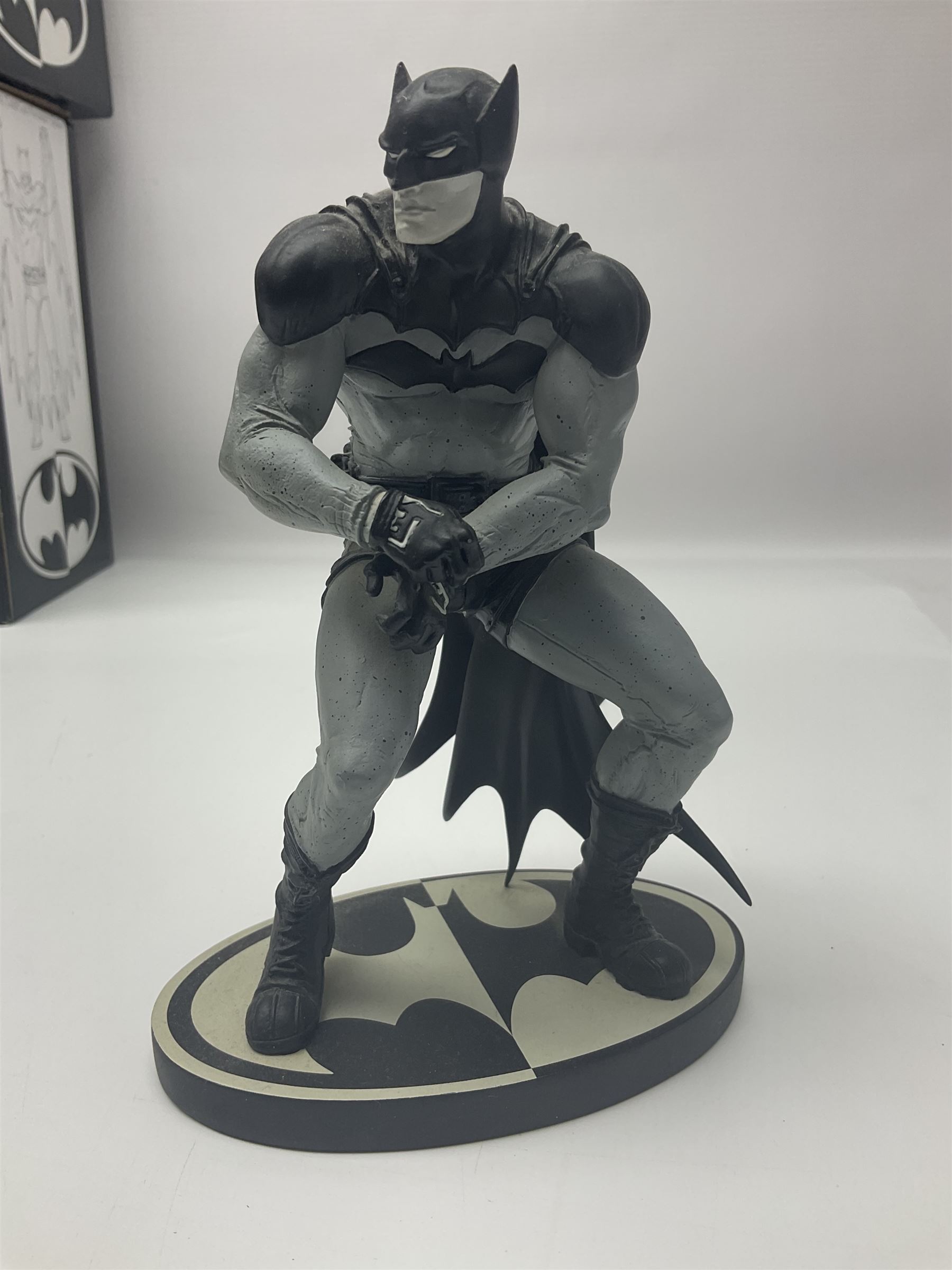 Group of five limited edition DC Direct Black and White Batman hand-painted cold-cast porcelain statues in original boxes, with two similar examples from DC Collectibles 