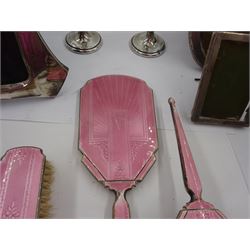Group of silver, to include three piece pink guilloche enamel dressing table set, pair of trumpet vases and three silver photograph frames, all hallmarked, tallest frame H