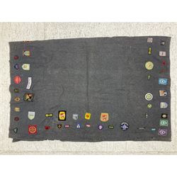 Boy Scout Interest; Scout blanket with collection of Boy Scouts cloth insignias and similar, to include badges from Lealholm North Yorkshire, Cleveland Country, South Shields etc, approximately 115 badges  