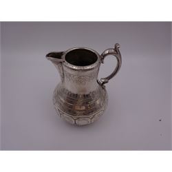 Arts and Crafts silver jug, of bellied form with C handle, the body engraved with a band of floral panels, with engraved scrolling and foliate decoration throughout, hallmarked hallmarked Samuel Smily, Goldsmiths Alliance, London 1873, H13cm