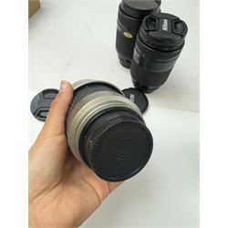 Four Nikon camera lenses, to include AF Nikkor 70-210mm 1:4-5.6 serial no. 2000640, AF Nikkor 70-300mm 1:4-5.6 G serial no. 2284940, AF Nikkor 35-135mm 1:3.5-4.5 serial no 301027 and AF Nikkor 28-100mm 1:3.5-5.6 G serial no 2185570