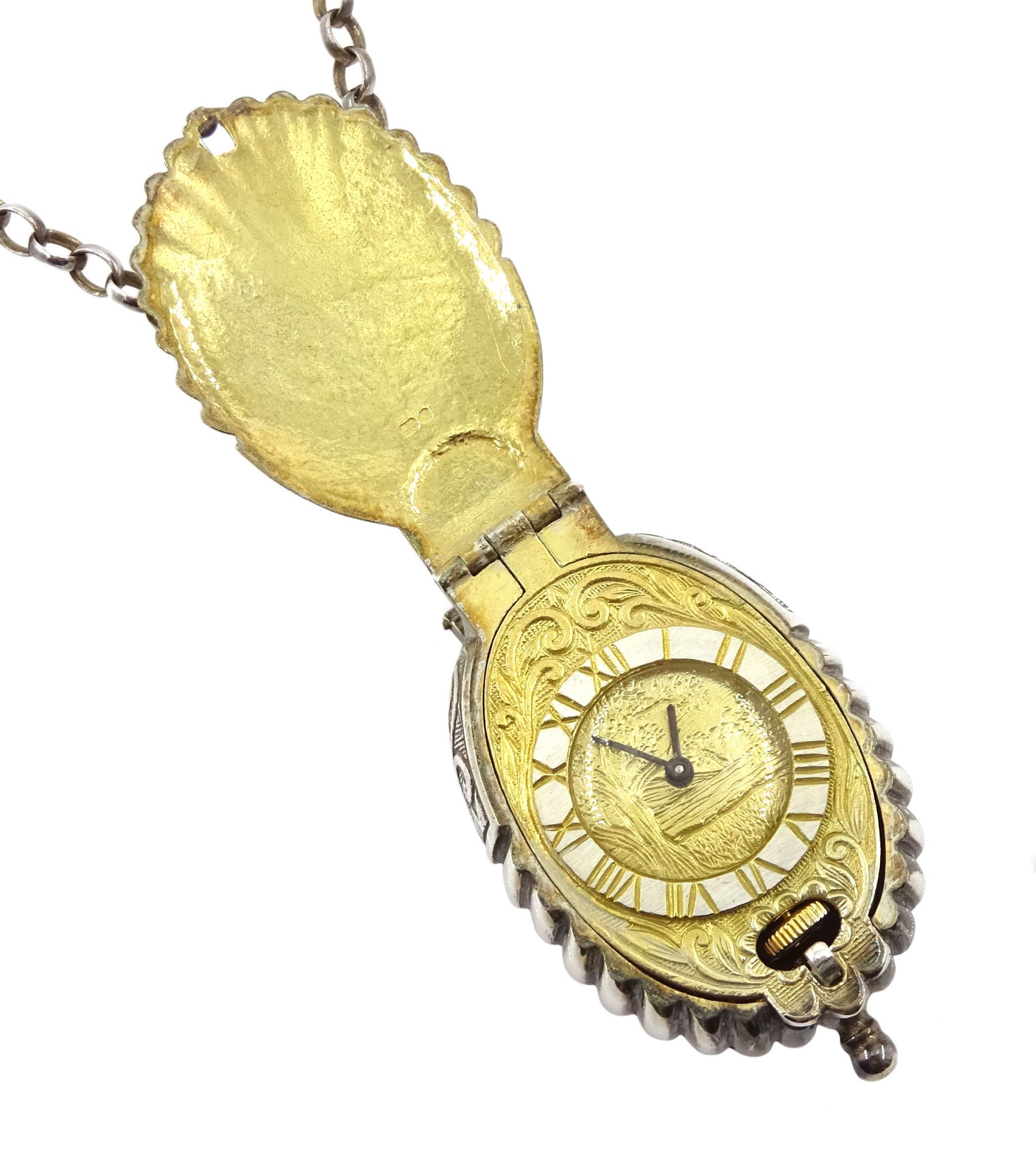 Silver and silver-gilt novelty manual wind watch pendant, in the form of a shell, by St James House Company, London 1975, on silver belcher link chain necklace, boxed