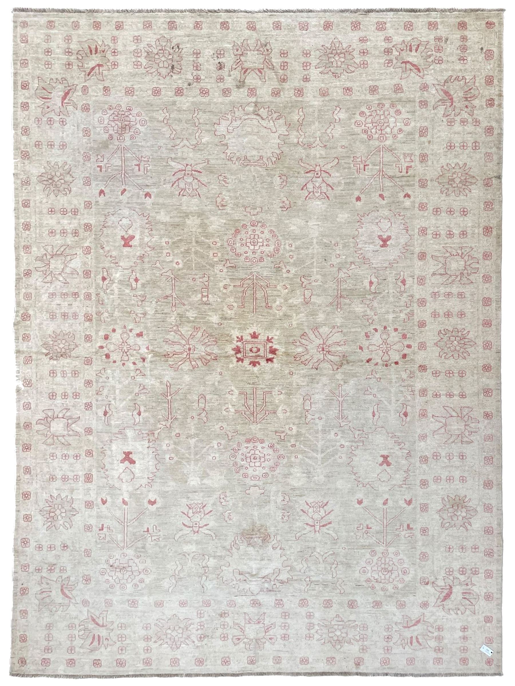 Persian design pale ivory ground carpet, decorated with stylised plant and leaf motifs in pale red