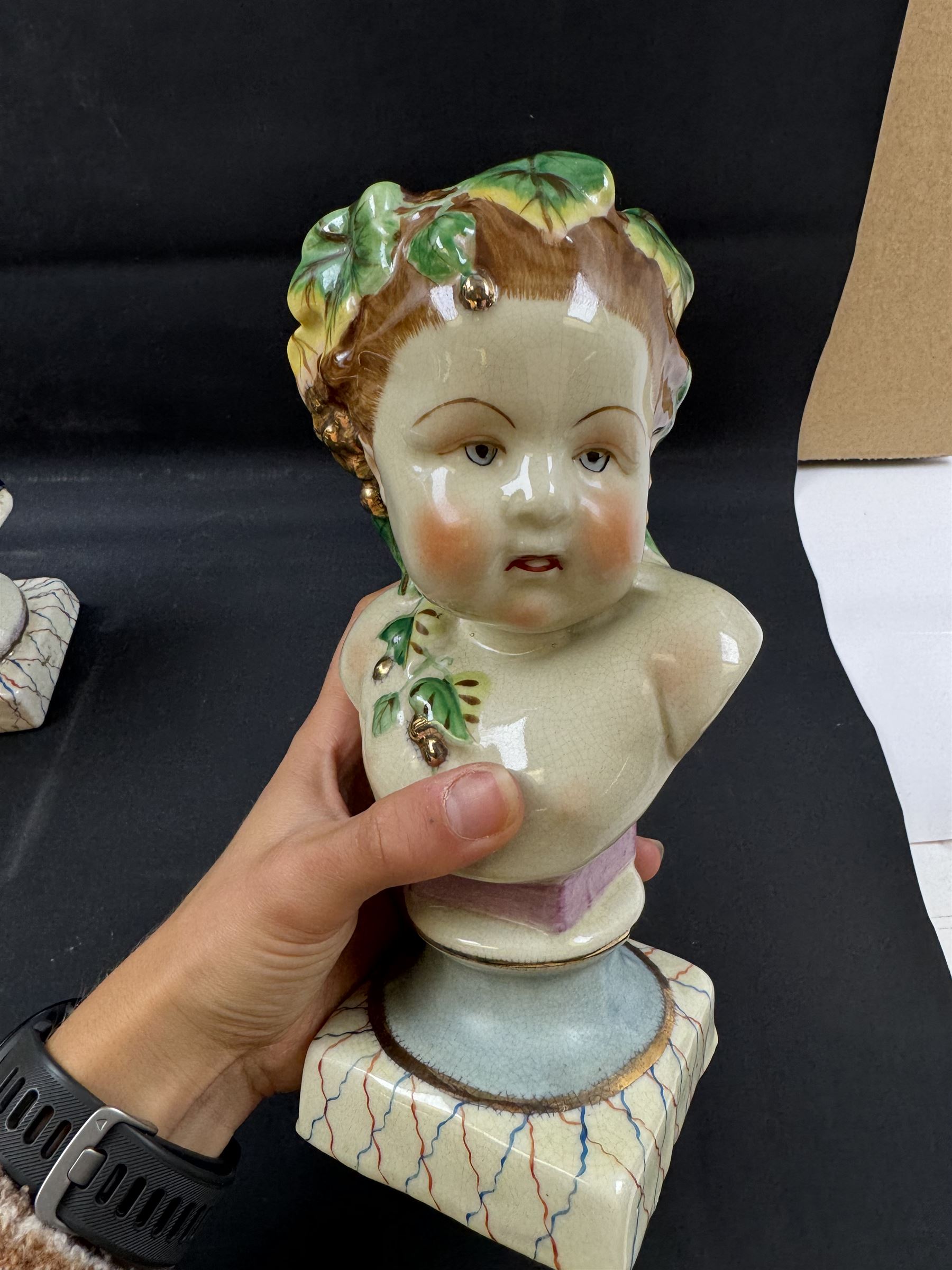 Pair or 20th century continental Bourbon children busts, together with another similar, H23cm