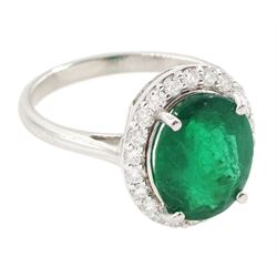 18ct white gold oval cut emerald and round brilliant cut diamond cluster ring, hallmarked, total emerald weight 3.33 carat, total diamond weight 0.40 carat, with World Gemological Institute Report