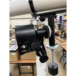 Tal-100R refractor telescope, the objective lens with dark purple coating and cylinder mounted with 6mm x 30mm finder scope, upon a pillar mount with right ascension clock drive, height when mounted H168cm, aperture 10cm, focal length 100cm 