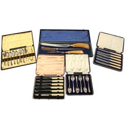 Horn handled three piece carving set, and four cased sets of cutlery