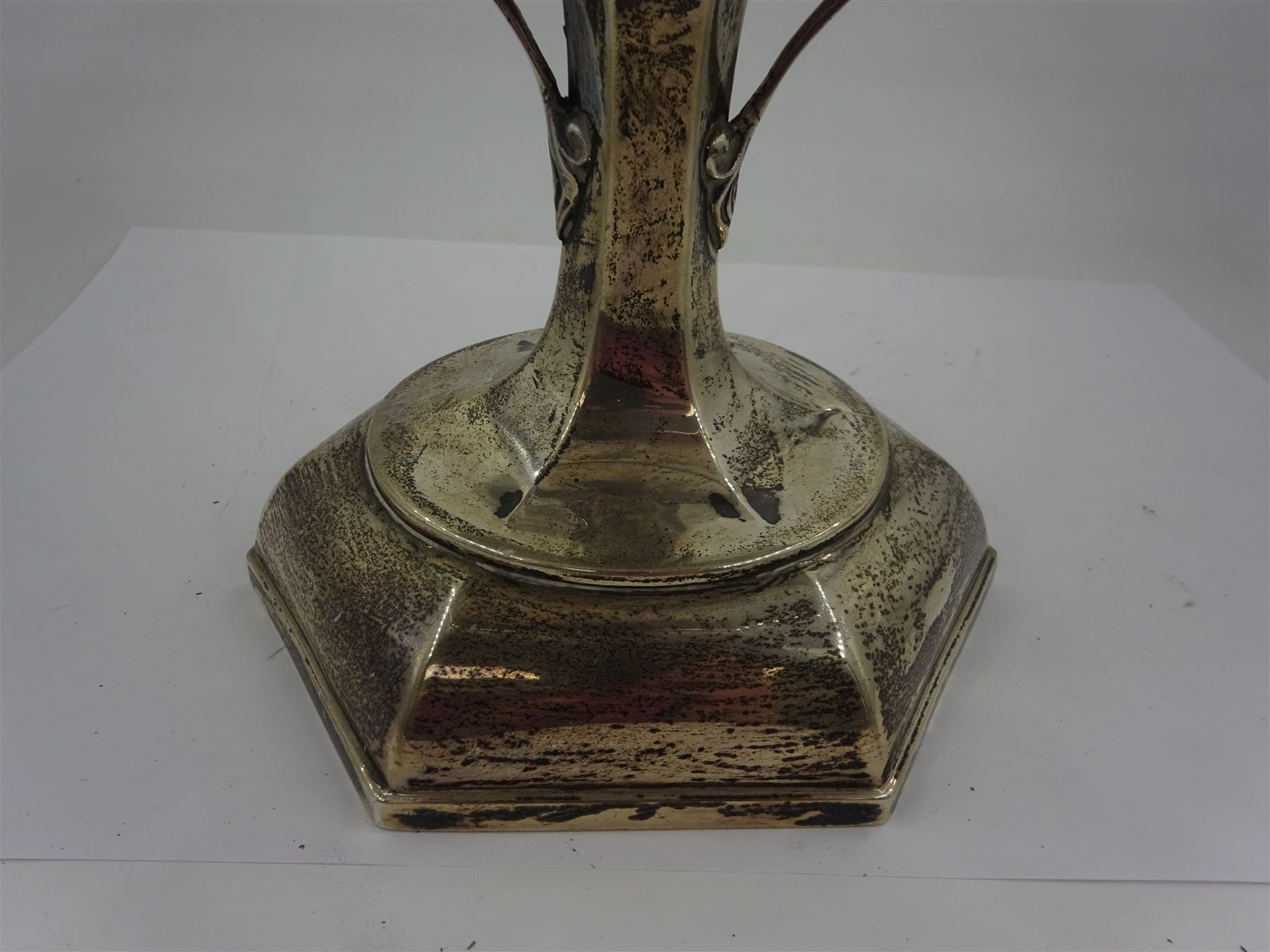 Early 20th century twin handled pedestal dish, of hexagonal form, with Art Nouveau inspired foliate mounted handles, upon a domed hexagonal foot, hallmarked Walker & Hall, Sheffield 1919, including handles H16.5cm