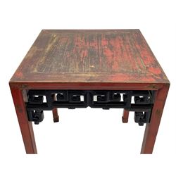 Late 19th century Chinese Qing dynasty red and black lacquered wood tall tea table, Shanxi region, square top over geometric scroll fretwork panels, on square supports with hoof feet 