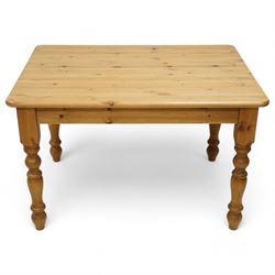 Traditional pine dining table, turned supports