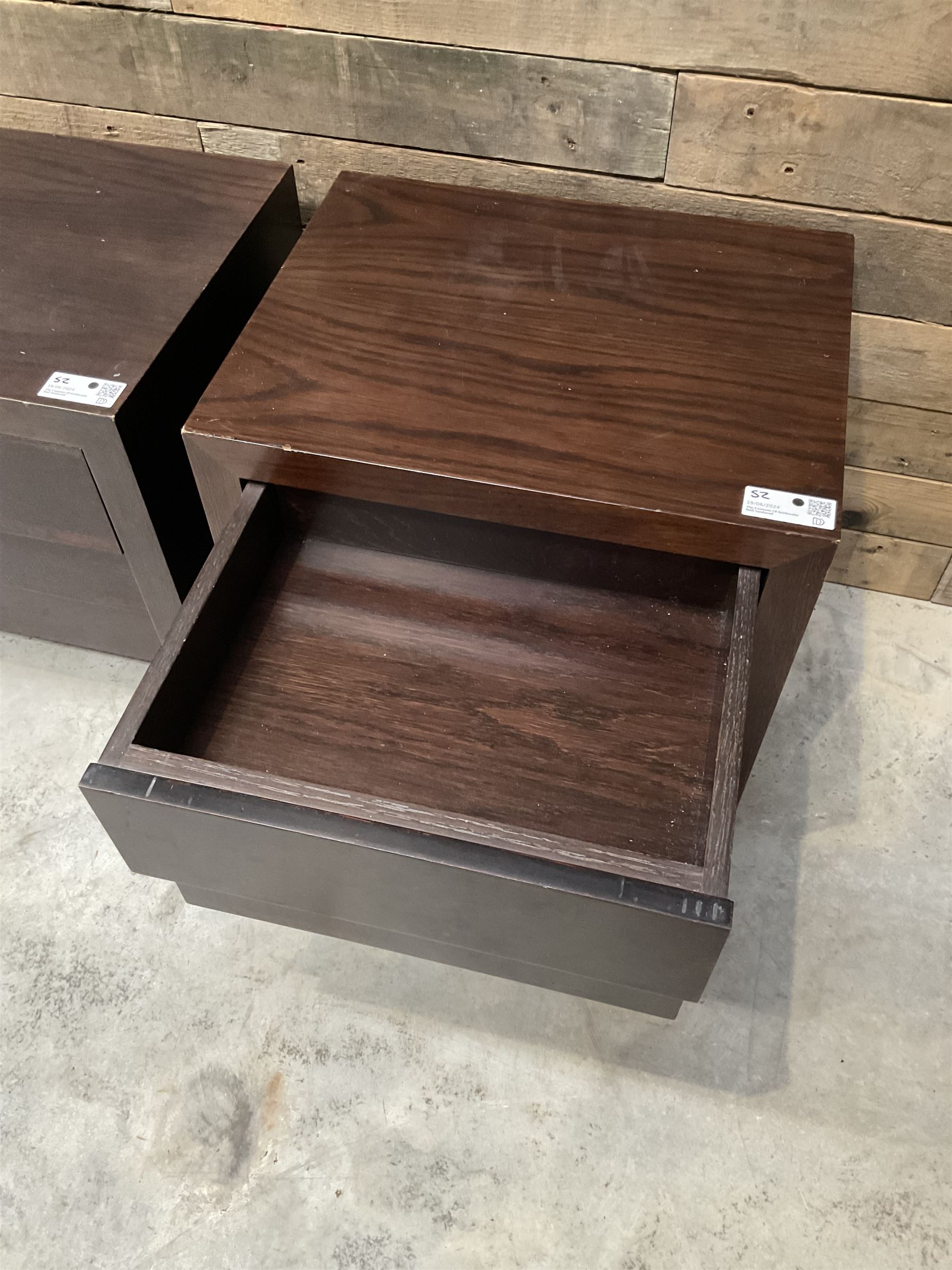 Four rosewood bedside chests, fitted with three stepped soft-close drawers