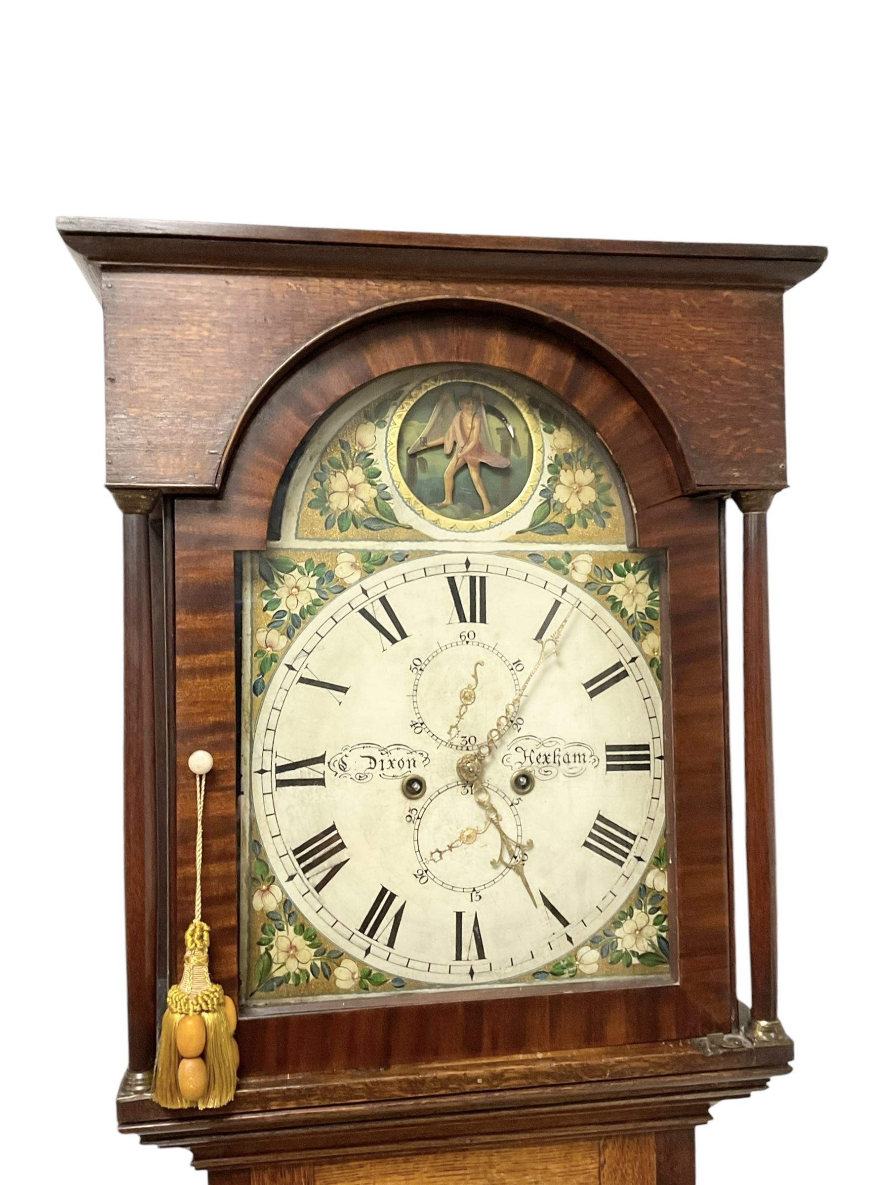 Dixon of Hexham - 19th century oak and mahogany 30-hour longcase clock, with a flat top and break arch hood door beneath, trunk with canted corners and a pointed top door, on a rectangular plinth with a shaped base, painted  dial with floral spandrels and a Father Time automaton to the arch, with Roman numerals, seconds and date dials and brass hands, dial pinned via a false plate to a chain driven countwheel striking movement, striking the hours on a bell. With pendulum and weight.