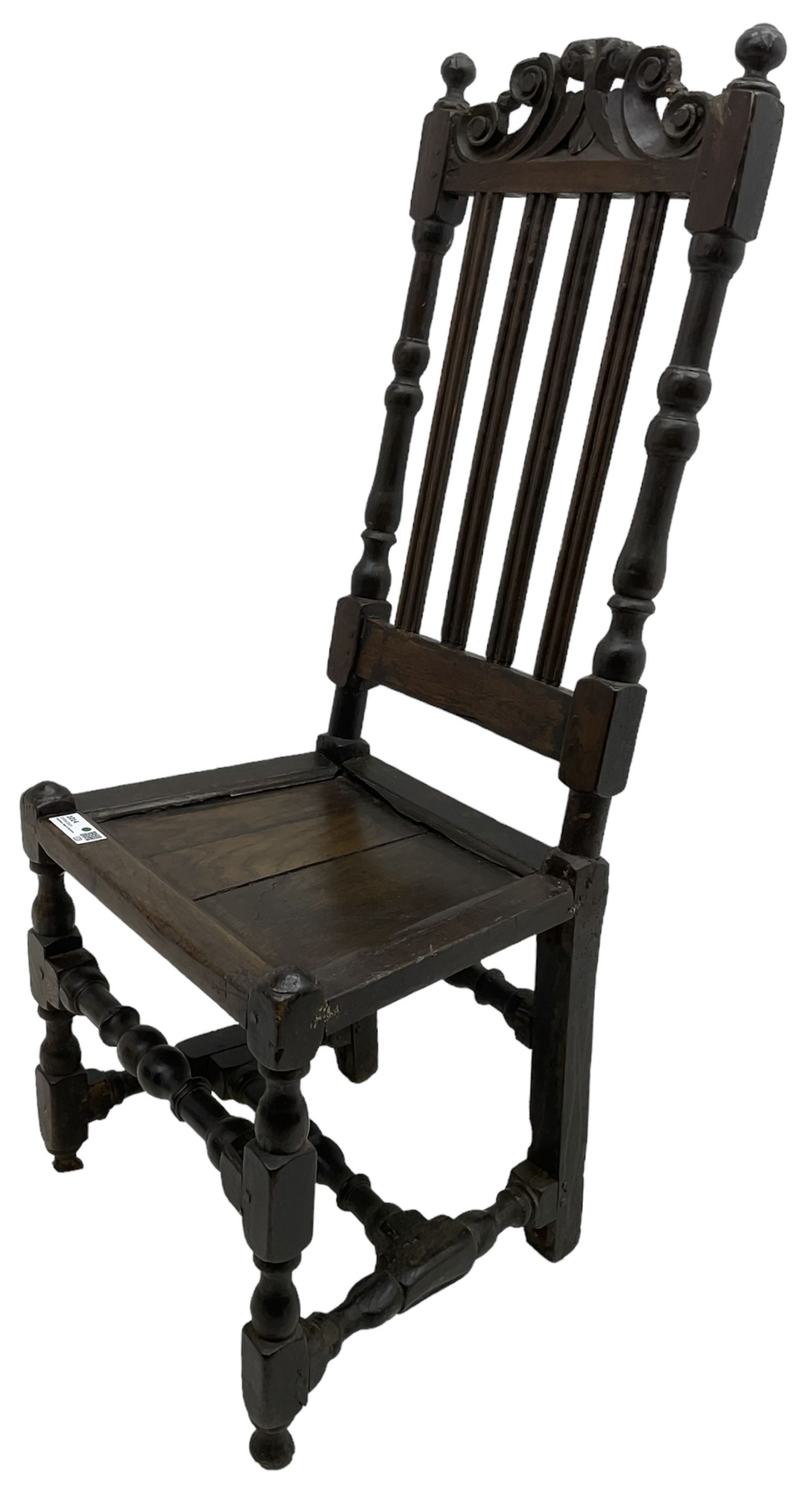 Jacobean oak hall chair, foliate carved cresting rail over moulded slat back and turned uprights, panelled seat over turned supports united by turned H-stretcher