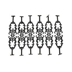 Set of twelve 20th century cast iron staircase baluster rails or balustrade, decorated with foliate scrolls