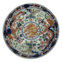 Pair of Chinese 'Dragon & Phoenix' porcelain saucers, centrally painted with a five claw dragon chasing the flaming pearl in iron red and gilt, within a border of confronting Dragons and Pheonix, amongst floral blooms, six character Guangxu mark beneath, D13.5cm