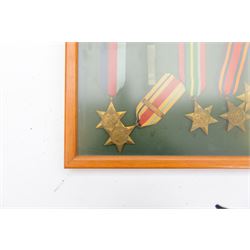 World War II medal group, comprising 1939-45 Star, Pacific Star, Burma Star, Italy Star, 
Atlantic Star, 1939-45 War medal and General Service medal, in glazed frame 