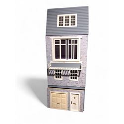 1:12 scale wooden four-storey dolls house with glazed shop front, with brick effect exteri...